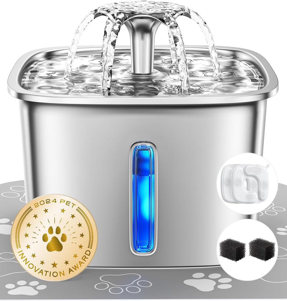 Cat drinking from a stainless steel pet fountain